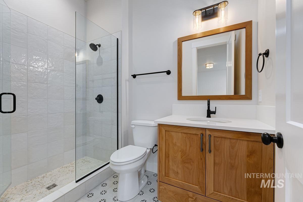 6774 Saddle Bred Way Star, ID 83669 - Photo 28 of 41 Full bathroom with vanity and a stall shower