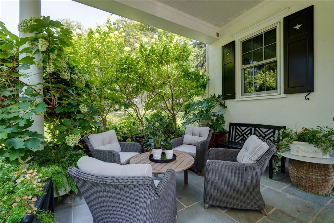 264 Alpine Drive Rochester, NY 14618 - Photo 39 of 50 The patio is large enough to accomodate a dinner p