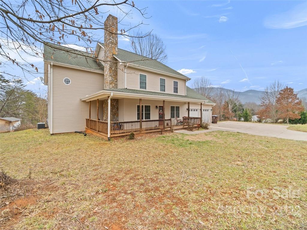 6758 Jenkins Road Morganton, NC 28655 - Photo 1 of 22 a front view of a house with swimming pool