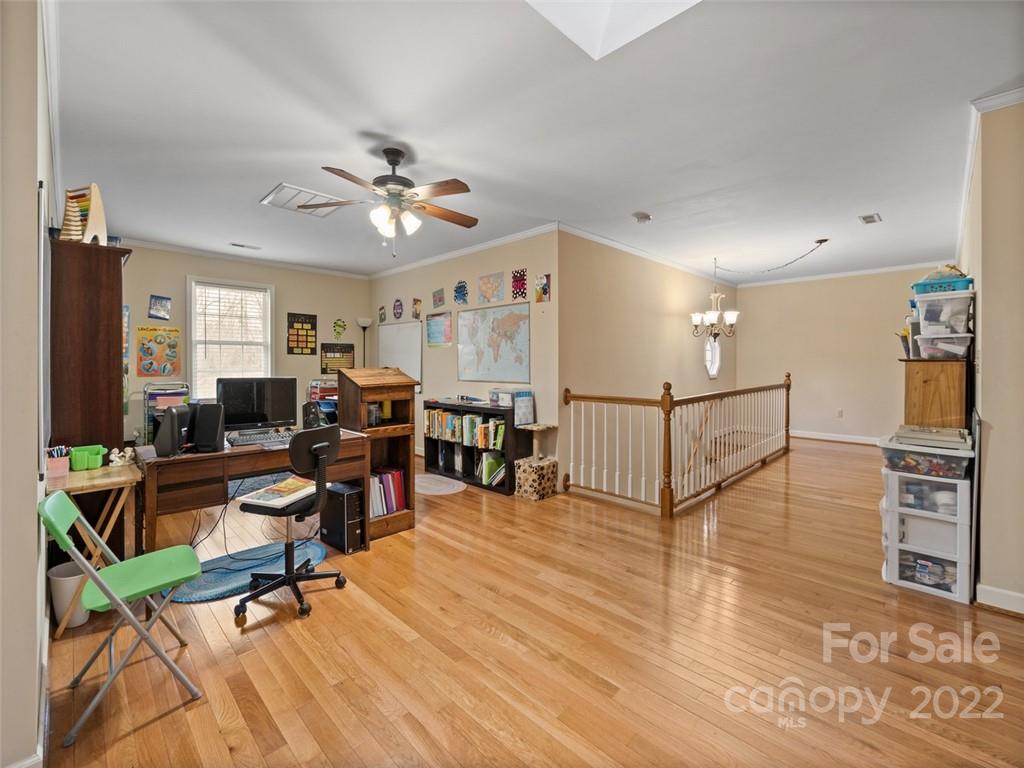 6758 Jenkins Road Morganton, NC 28655 - Photo 14 of 22 a view of a livingroom with workspace and a window