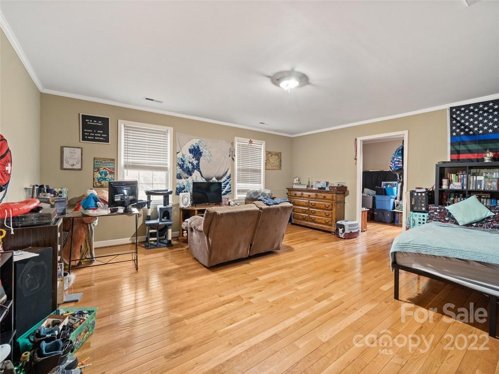 6758 Jenkins Road Morganton, NC 28655 - Photo 16 of 22 a living room with furniture and a wooden floor