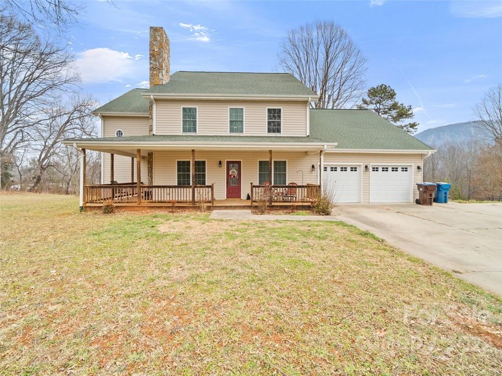6758 Jenkins Road Morganton, NC 28655 - Photo 2 of 22 a front view of a house with a yard