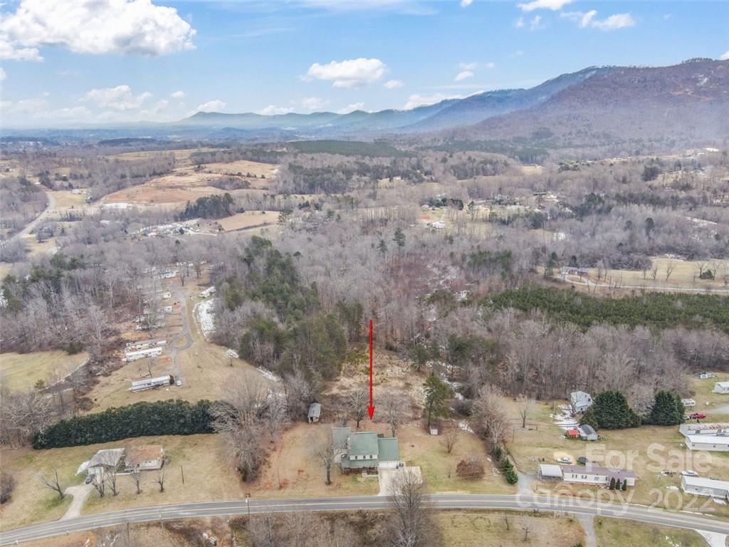 6758 Jenkins Road Morganton, NC 28655 - Photo 3 of 22 a view of a city from a yard