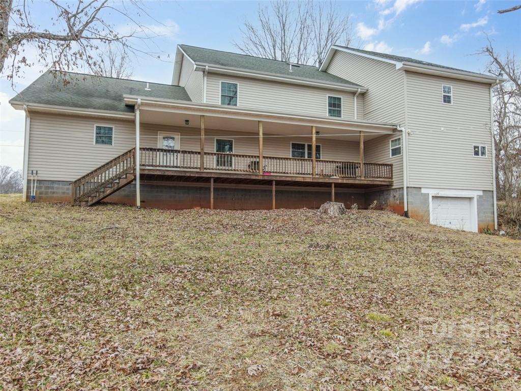6758 Jenkins Road Morganton, NC 28655 - Photo 6 of 22 a house that has a window in it