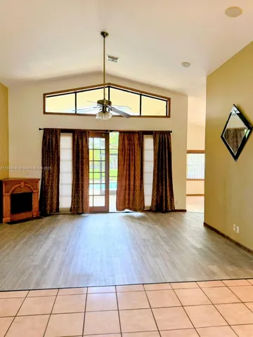 a view of an empty room with window