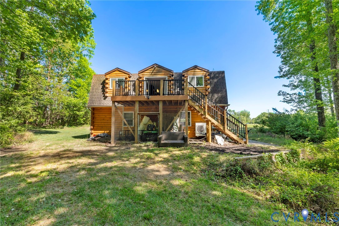 3235 Three Chopt Road Gum Spring, VA 23065 - Photo 29 of 33 a view of a house with a yard