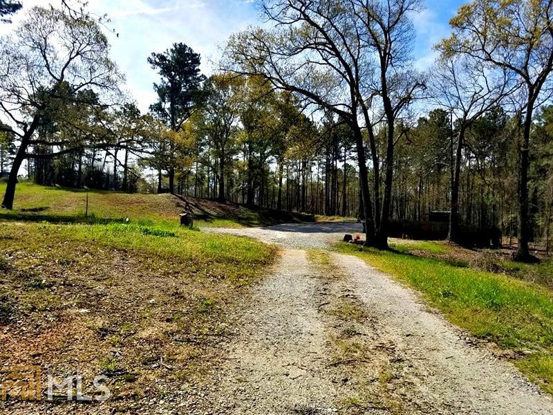 224 Englewood Road Southwest, Unit 2/8 Winder, GA 30680 - Photo 1 of 1 a view of a yard with a tree