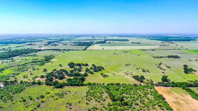 a view of a city with an ocean