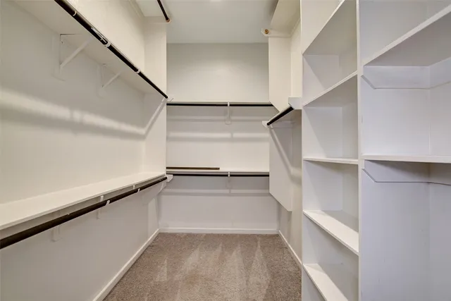 a view of an empty walk in closet