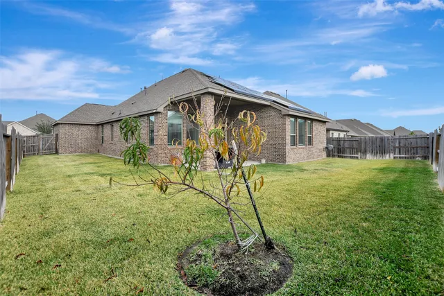 a house view with a garden space