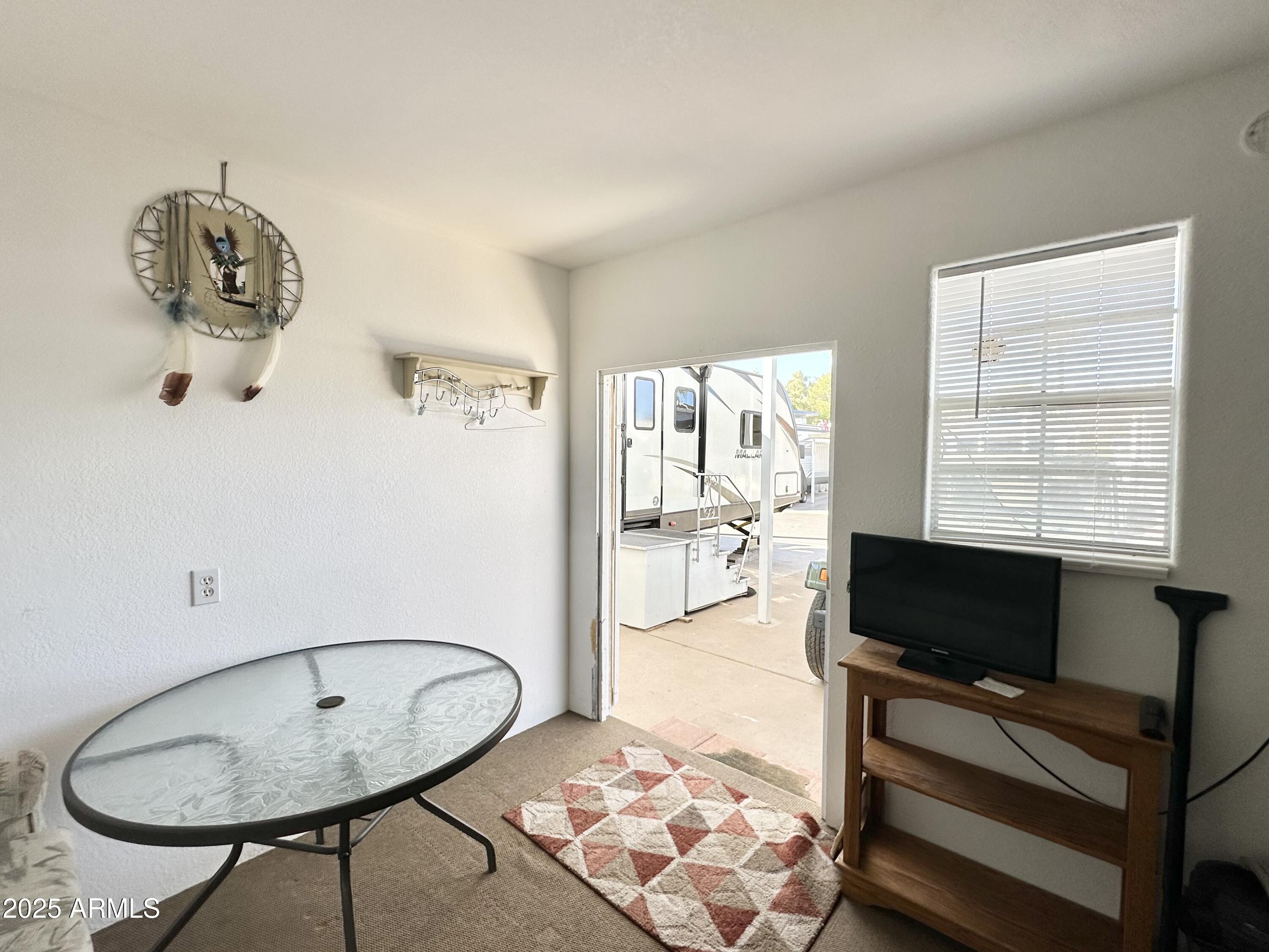 993 South Prospectors Road, Unit 993 Apache Junction, AZ 85119 - Photo 13 of 20 NICE ADDITIONAL LOUNGING AREA