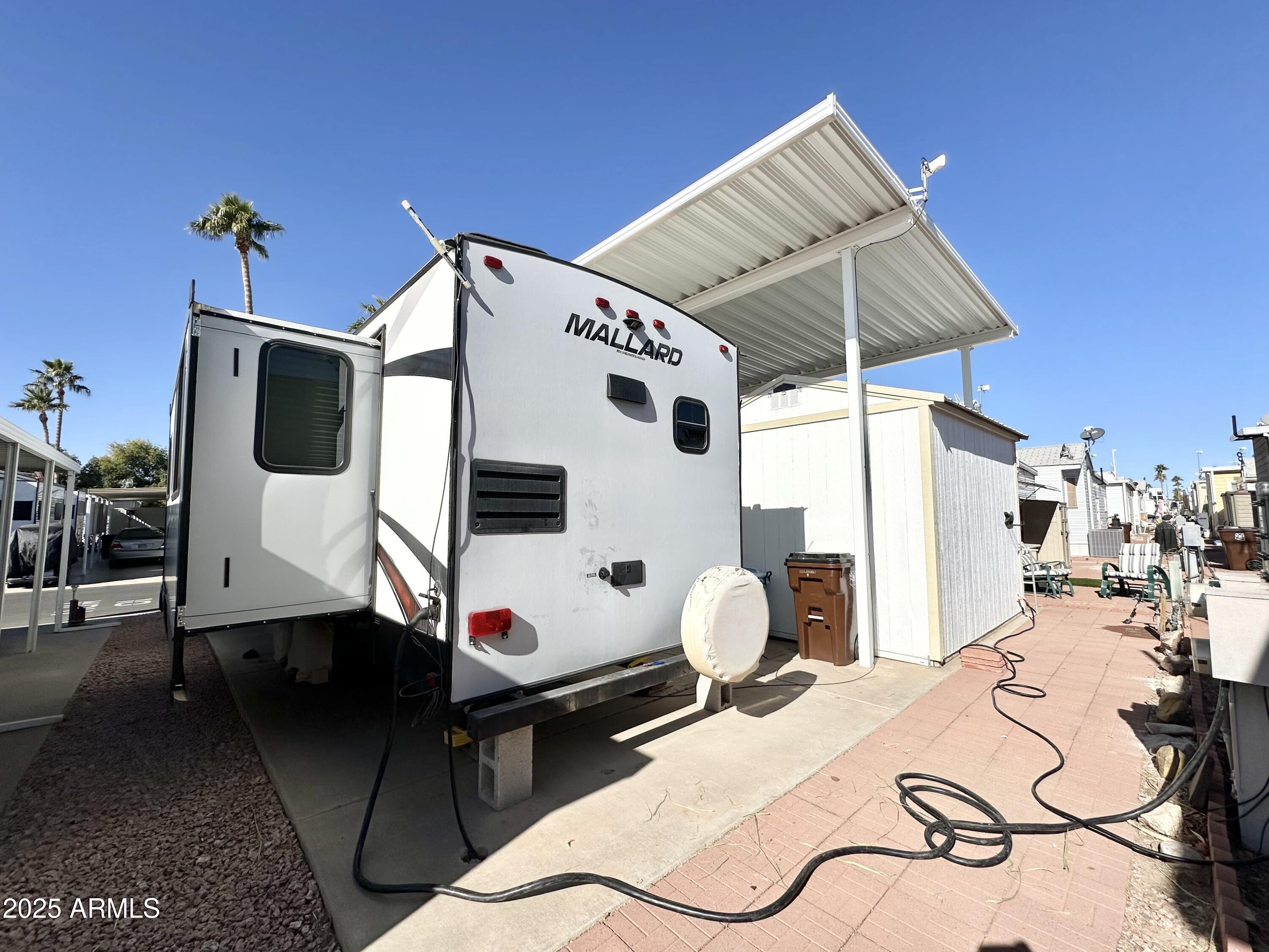 993 South Prospectors Road, Unit 993 Apache Junction, AZ 85119 - Photo 15 of 20 BACK VIEW/PATIO
