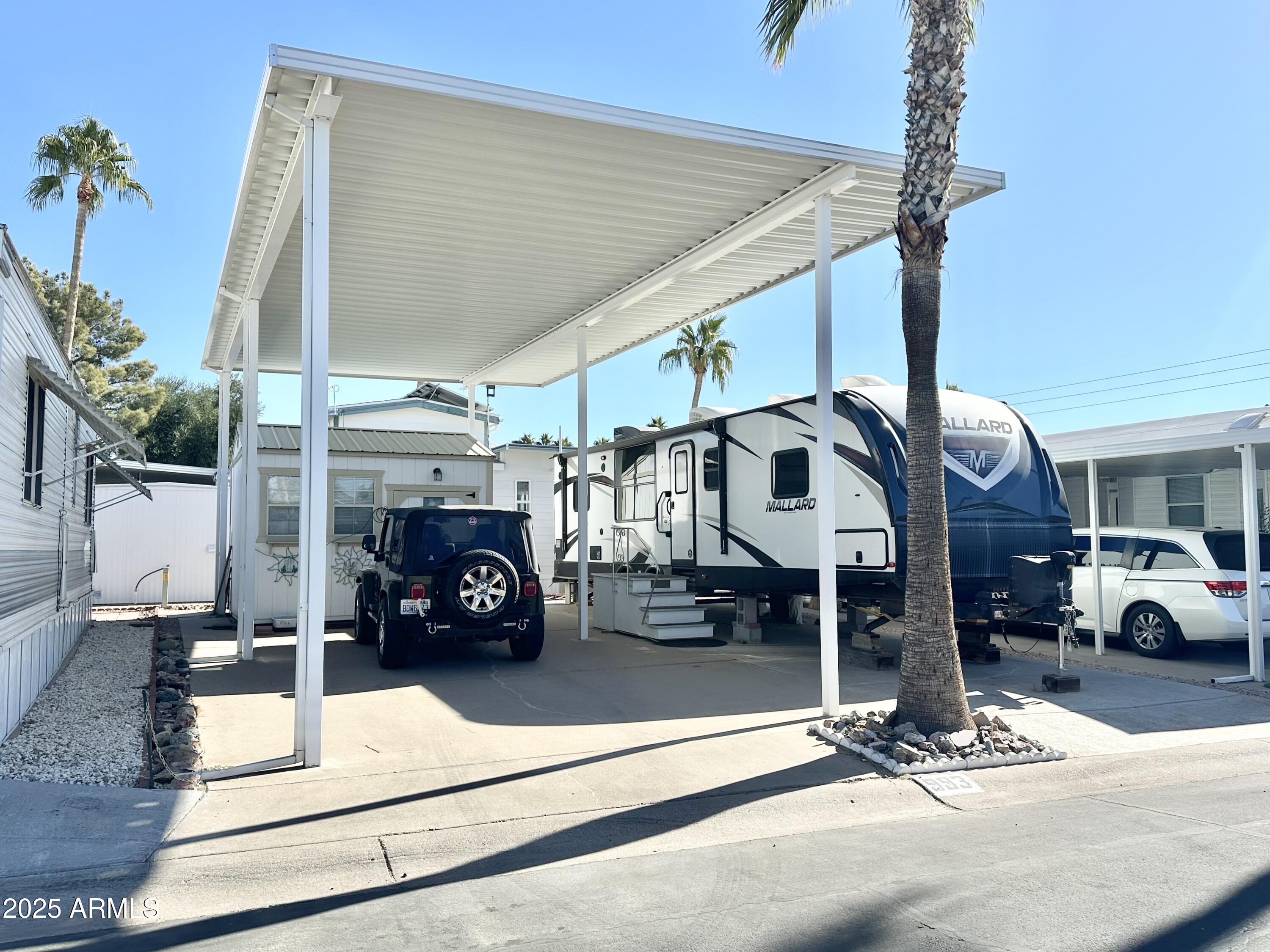 993 South Prospectors Road, Unit 993 Apache Junction, AZ 85119 - Photo 3 of 20 TALL AWNING GREAT FOR SHADE