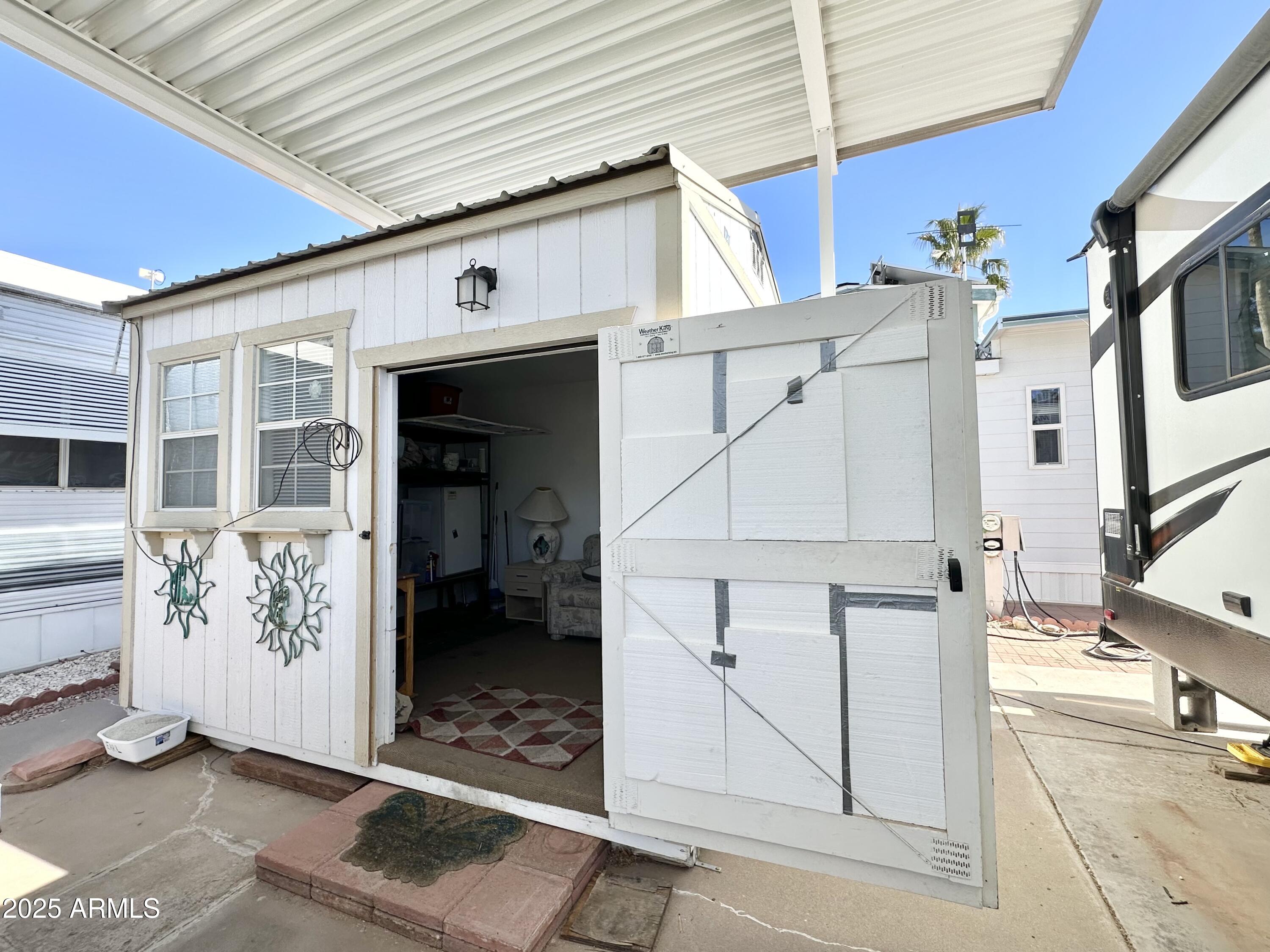 993 South Prospectors Road, Unit 993 Apache Junction, AZ 85119 - Photo 9 of 20 SHED ENTRY