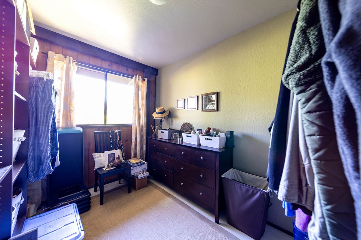 17-497 Homestead Road Kurtistown, HI 96760 - Photo 14 of 28 a bed room with a bed and a window