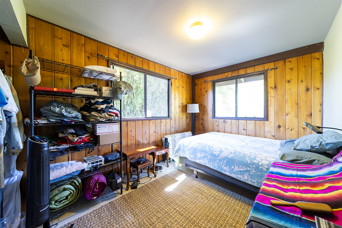 17-497 Homestead Road Kurtistown, HI 96760 - Photo 15 of 28 a bedroom with bed and a window