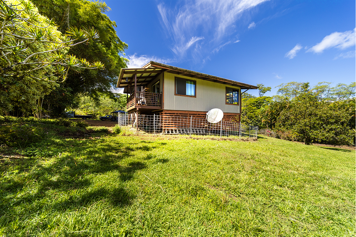 17-497 Homestead Road Kurtistown, HI 96760 - Photo 22 of 28 a house view with a outdoor space