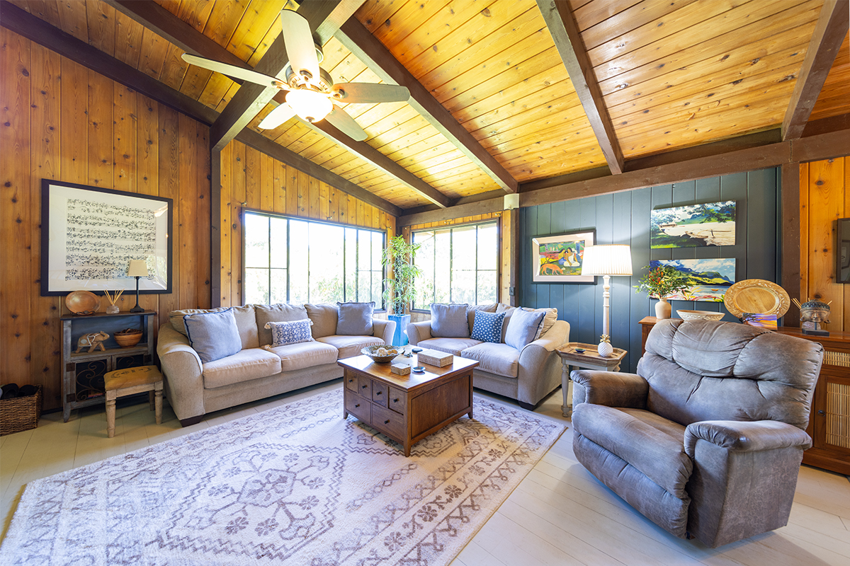 17-497 Homestead Road Kurtistown, HI 96760 - Photo 3 of 28 a living room with furniture and a large window