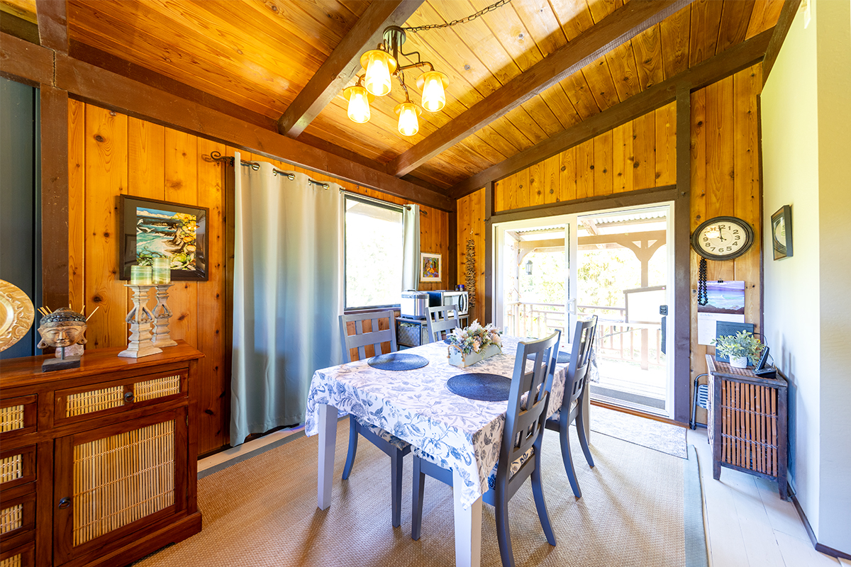 17-497 Homestead Road Kurtistown, HI 96760 - Photo 6 of 28 a view of a dining room with furniture window and outside view