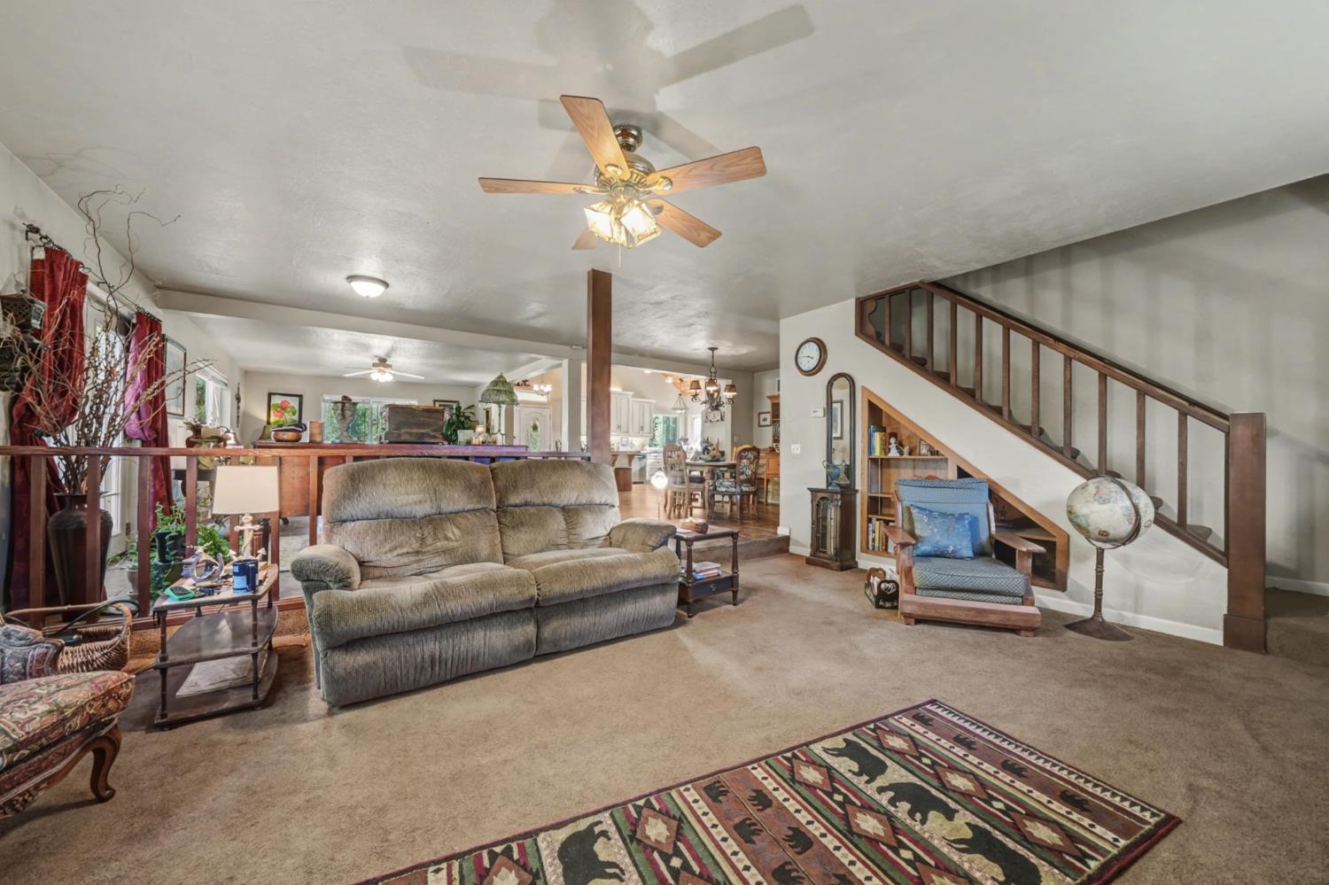 6145 Swiss Ranch Road Mountain Ranch, CA 95246 - Photo 30 of 84 a living room with furniture and a flat screen tv