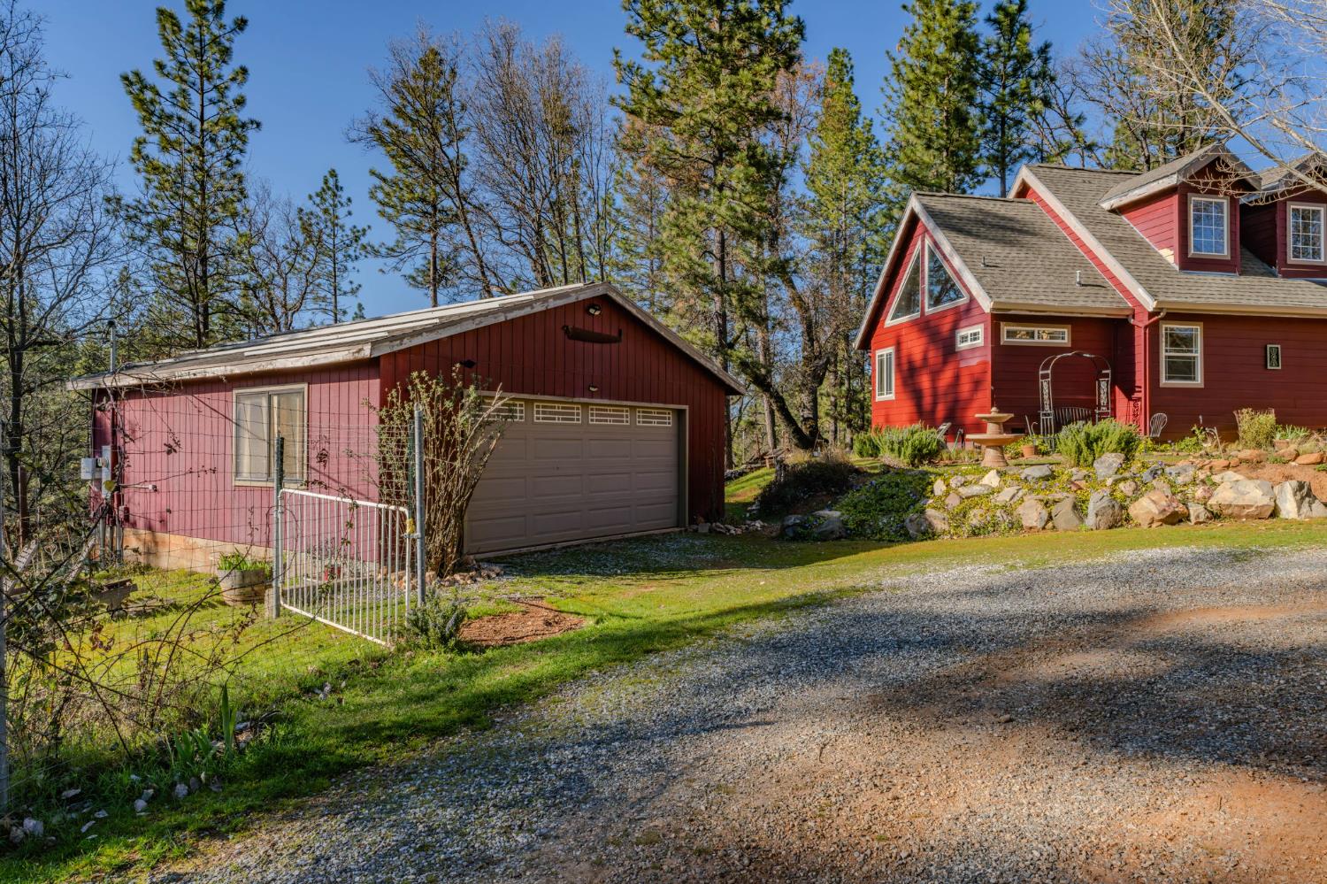 6145 Swiss Ranch Road Mountain Ranch, CA 95246 - Photo 4 of 84 a front view of house with yard