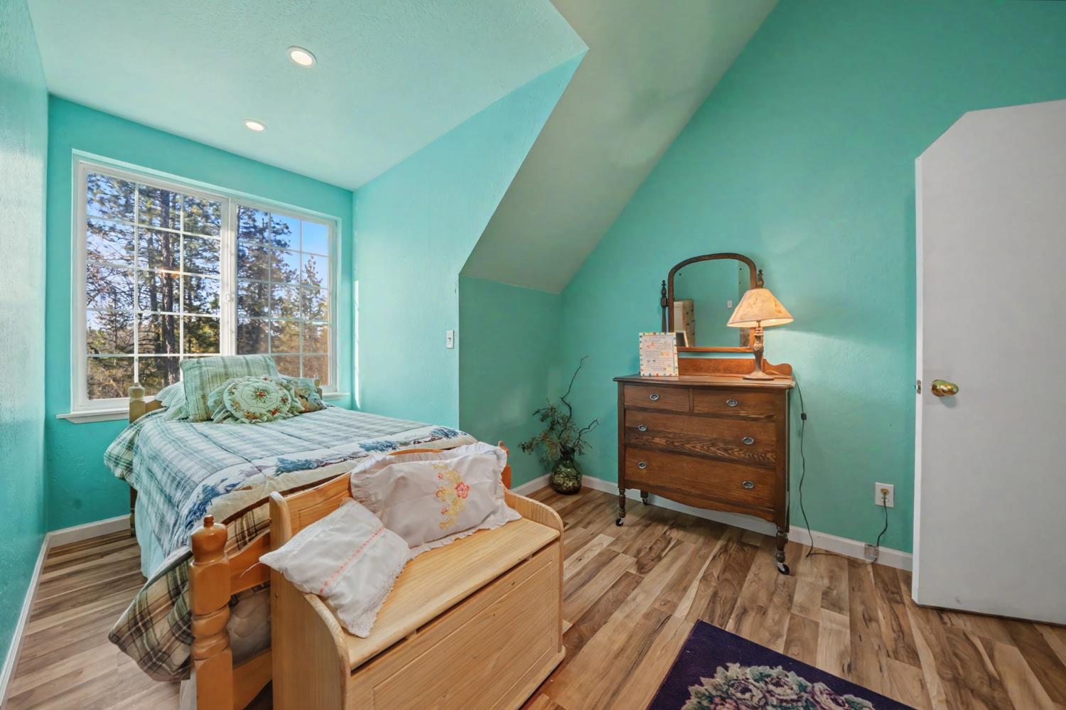 6145 Swiss Ranch Road Mountain Ranch, CA 95246 - Photo 46 of 84 a bedroom with a bed and a window