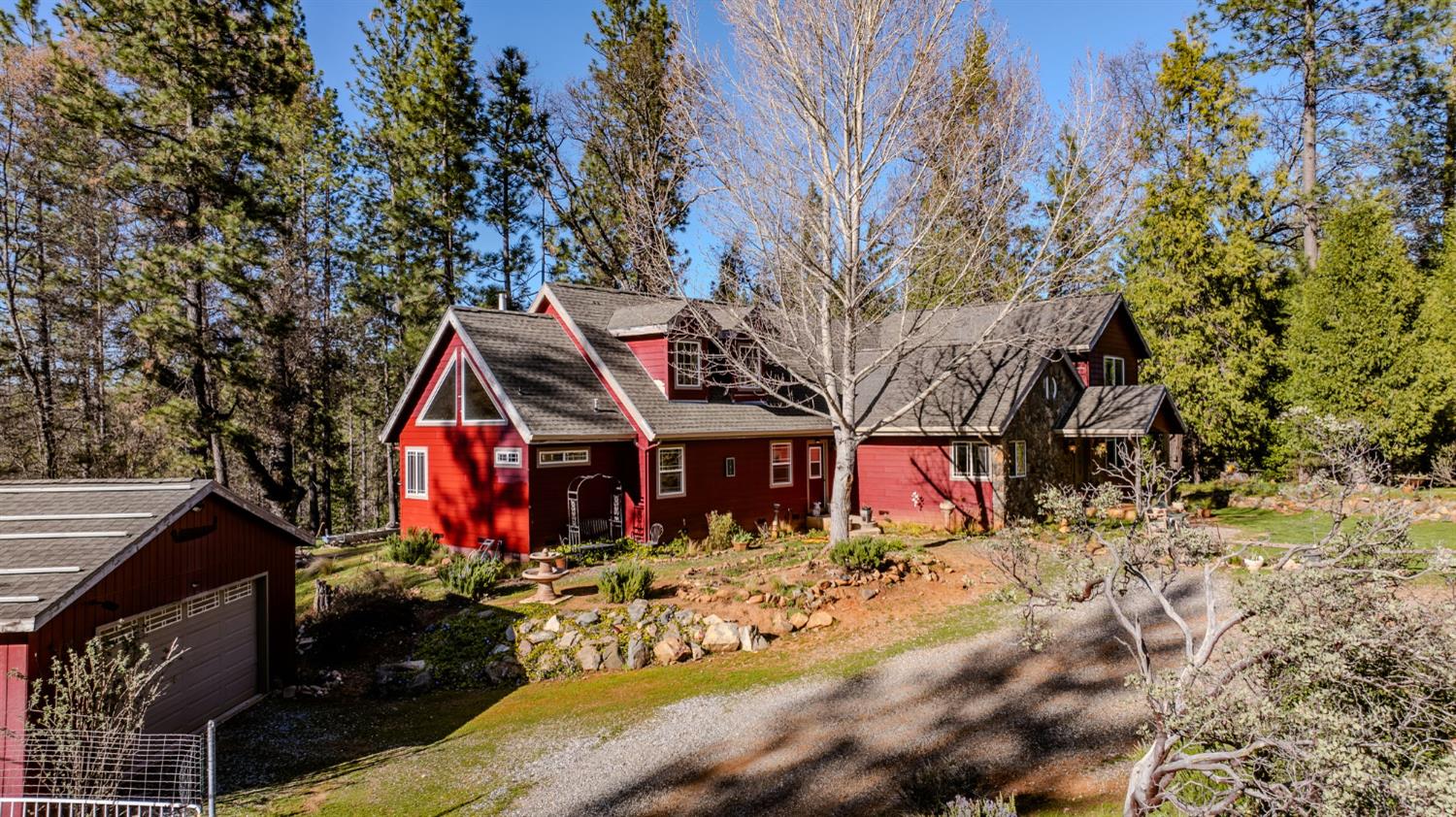 6145 Swiss Ranch Road Mountain Ranch, CA 95246 - Photo 54 of 84 a front view of house with sign board and yard