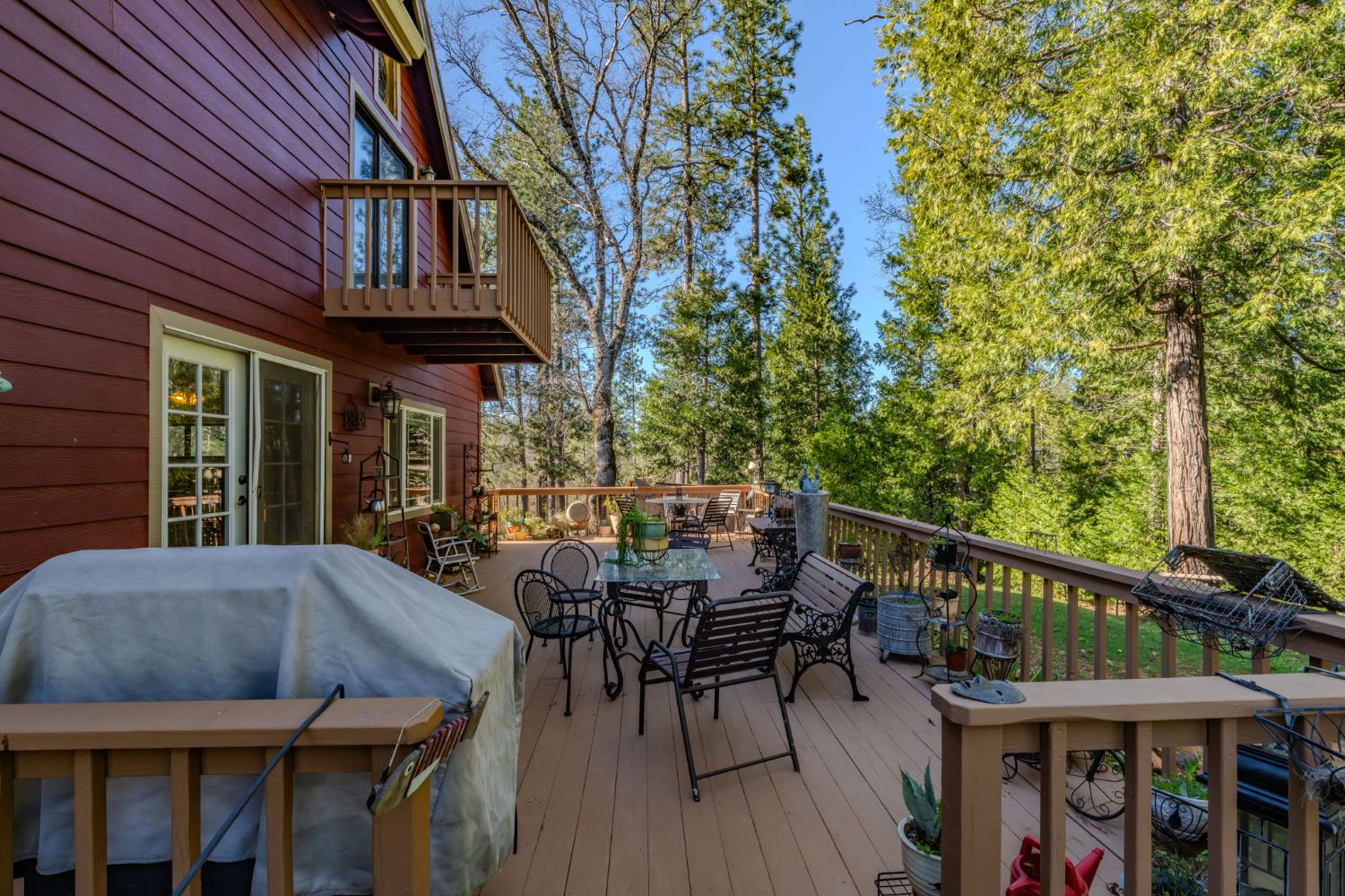 6145 Swiss Ranch Road Mountain Ranch, CA 95246 - Photo 60 of 84 a view of a patio with a table and chairs