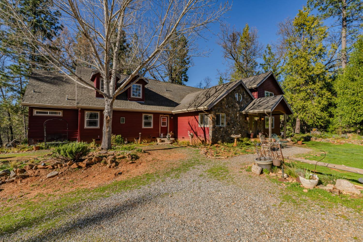 6145 Swiss Ranch Road Mountain Ranch, CA 95246 - Photo 6 of 84 a view of a house with a yard