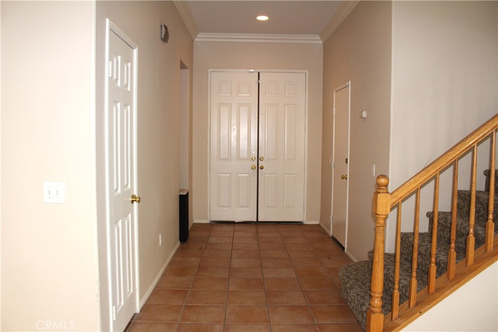 7881 Margaux Place Rancho Cucamonga, CA 91739 - Photo 11 of 41 a view of a hallway with a door