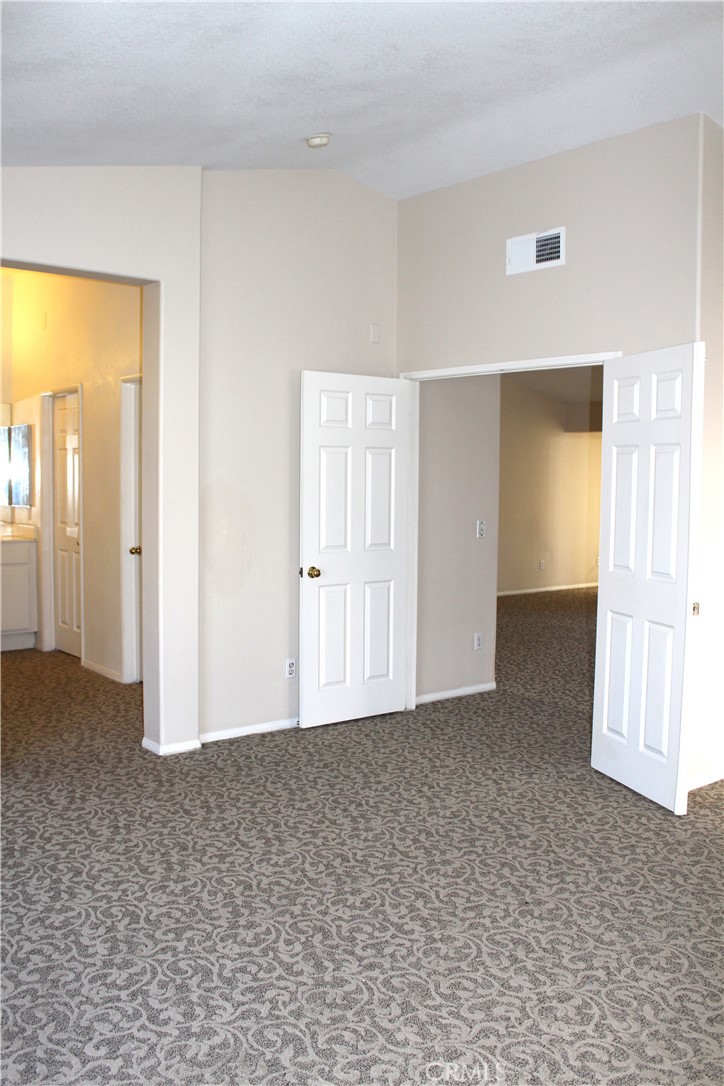 7881 Margaux Place Rancho Cucamonga, CA 91739 - Photo 15 of 41 an empty room with windows and closet