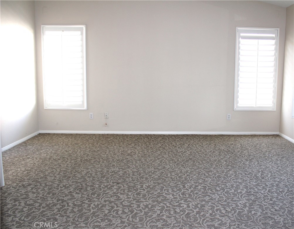 7881 Margaux Place Rancho Cucamonga, CA 91739 - Photo 16 of 41 an empty room with a window