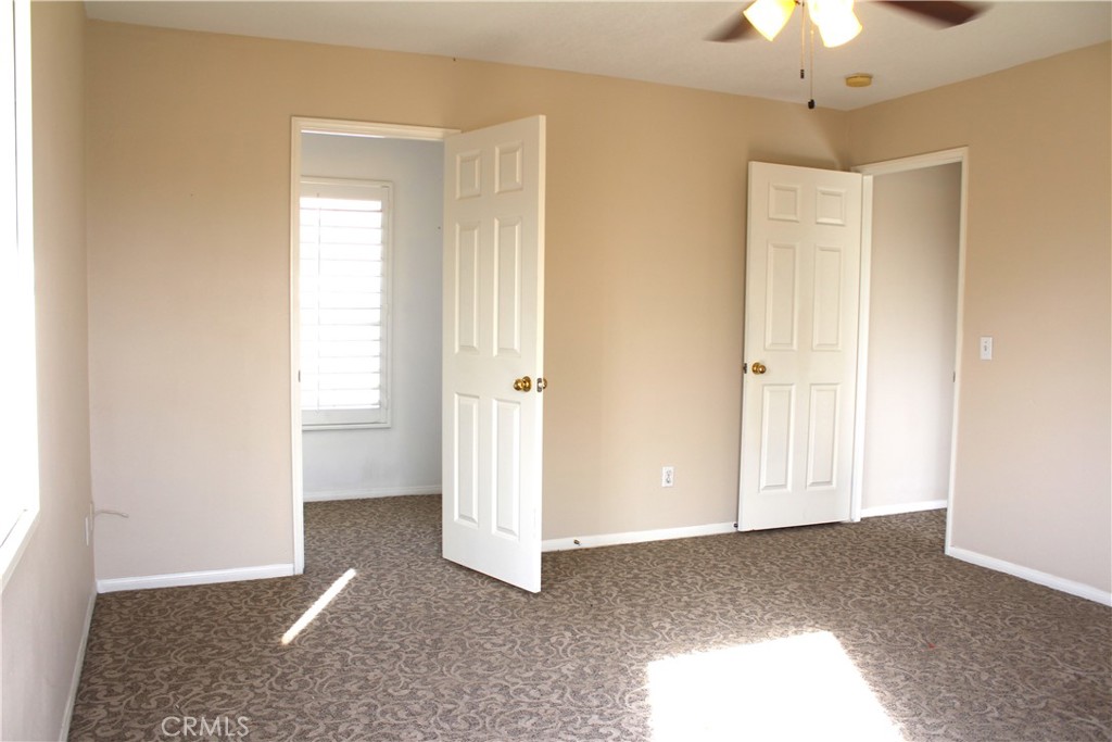 7881 Margaux Place Rancho Cucamonga, CA 91739 - Photo 23 of 41 a view of livingroom with hardwood floor and window