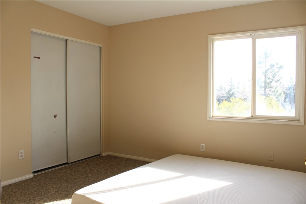 7881 Margaux Place Rancho Cucamonga, CA 91739 - Photo 28 of 41 a view of an empty room with a window