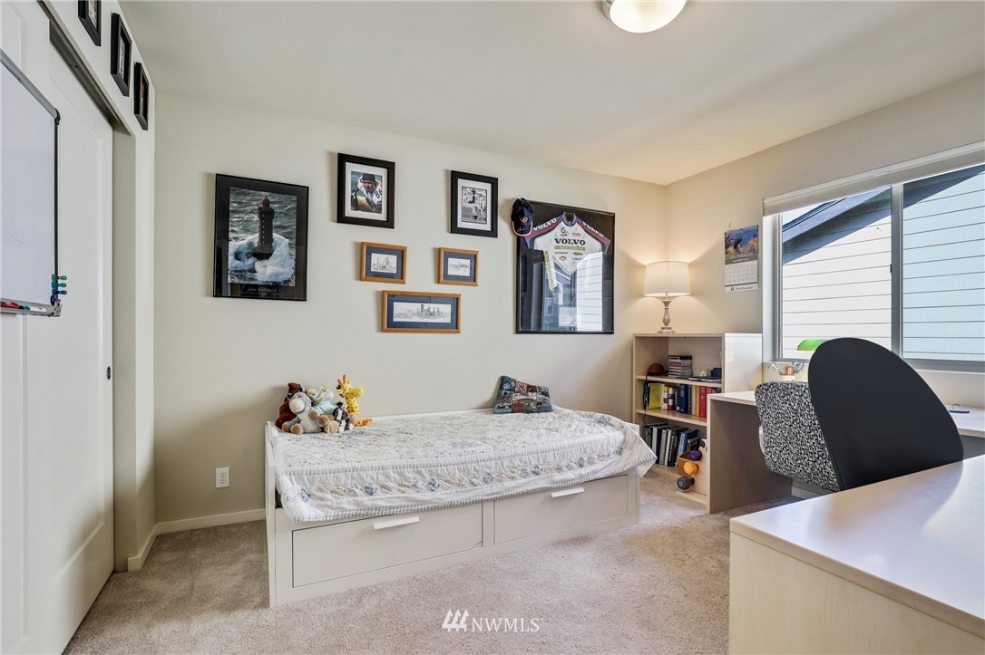19237 97th Avenue South Renton, WA 98055 - Photo 22 of 29 a living room with furniture and a table