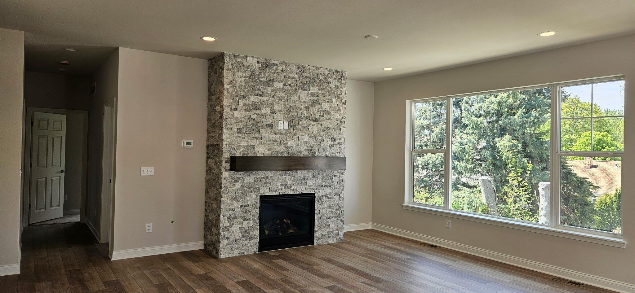 339 Sandy Circle Pewaukee, WI 53072 - Photo 2 of 19 GFP w/stacked stone to ceiling
