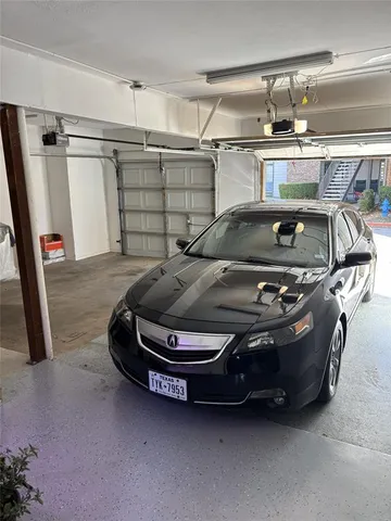 a front view of a house with exposed pipes and a window