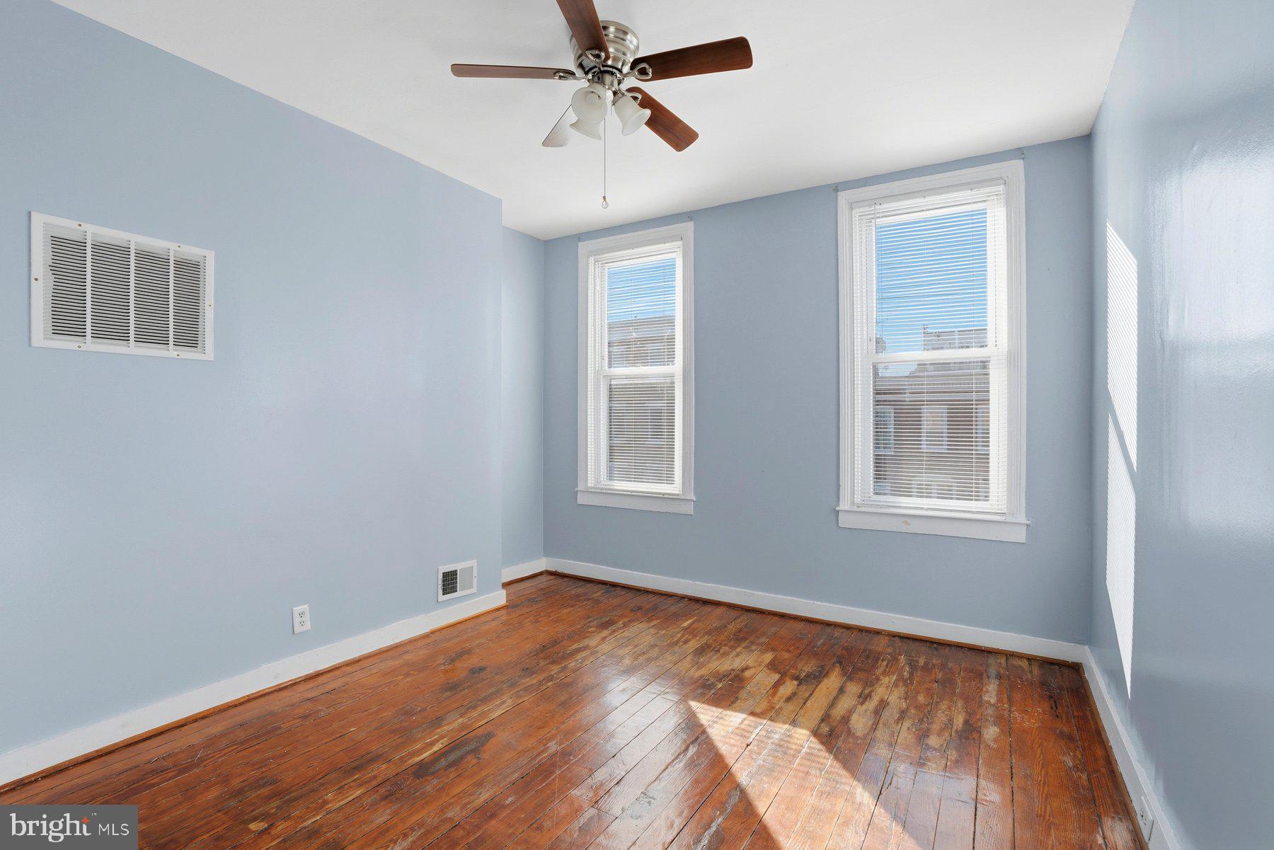 12 West Randall Street Baltimore, MD 21230 - Photo 20 of 28 a view of a room with window and ceiling fan