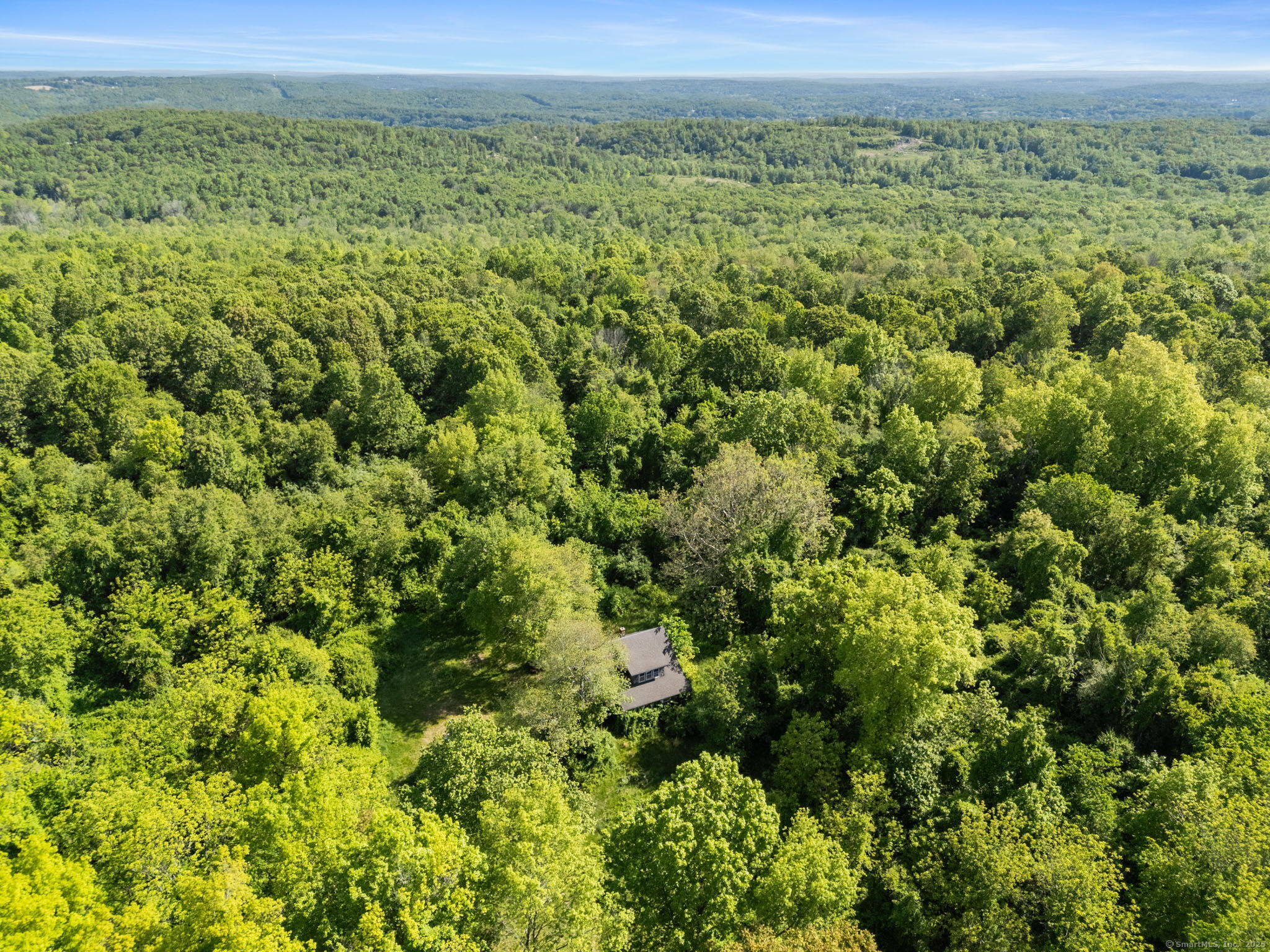 63 Velgouse Road Montville, CT 06370 - Photo 16 of 21 a view of a lush green field