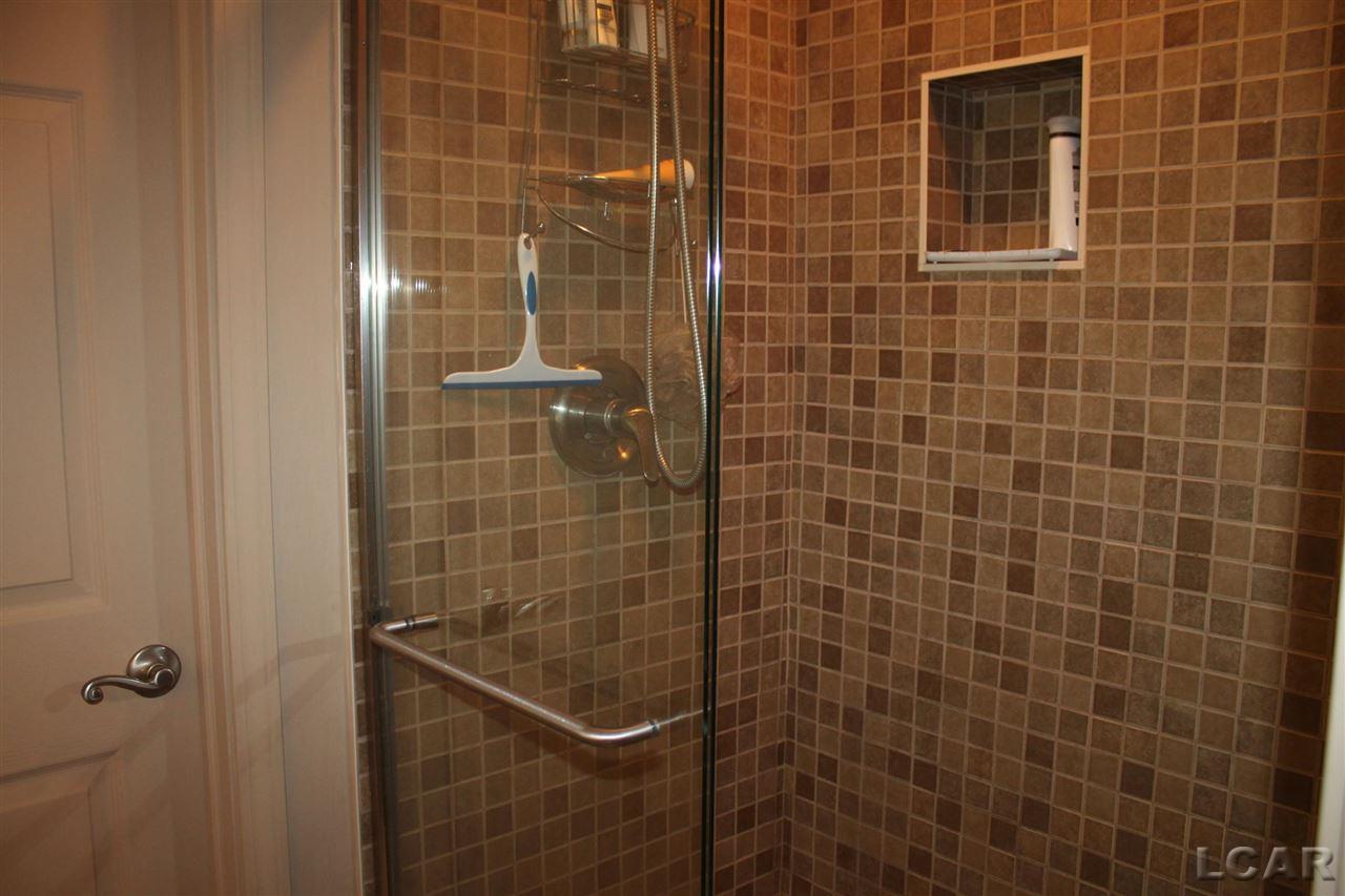 617 Ridge Lane Tecumseh, MI 49286 - Photo 23 of 34 Tiled Walk-in Shower
