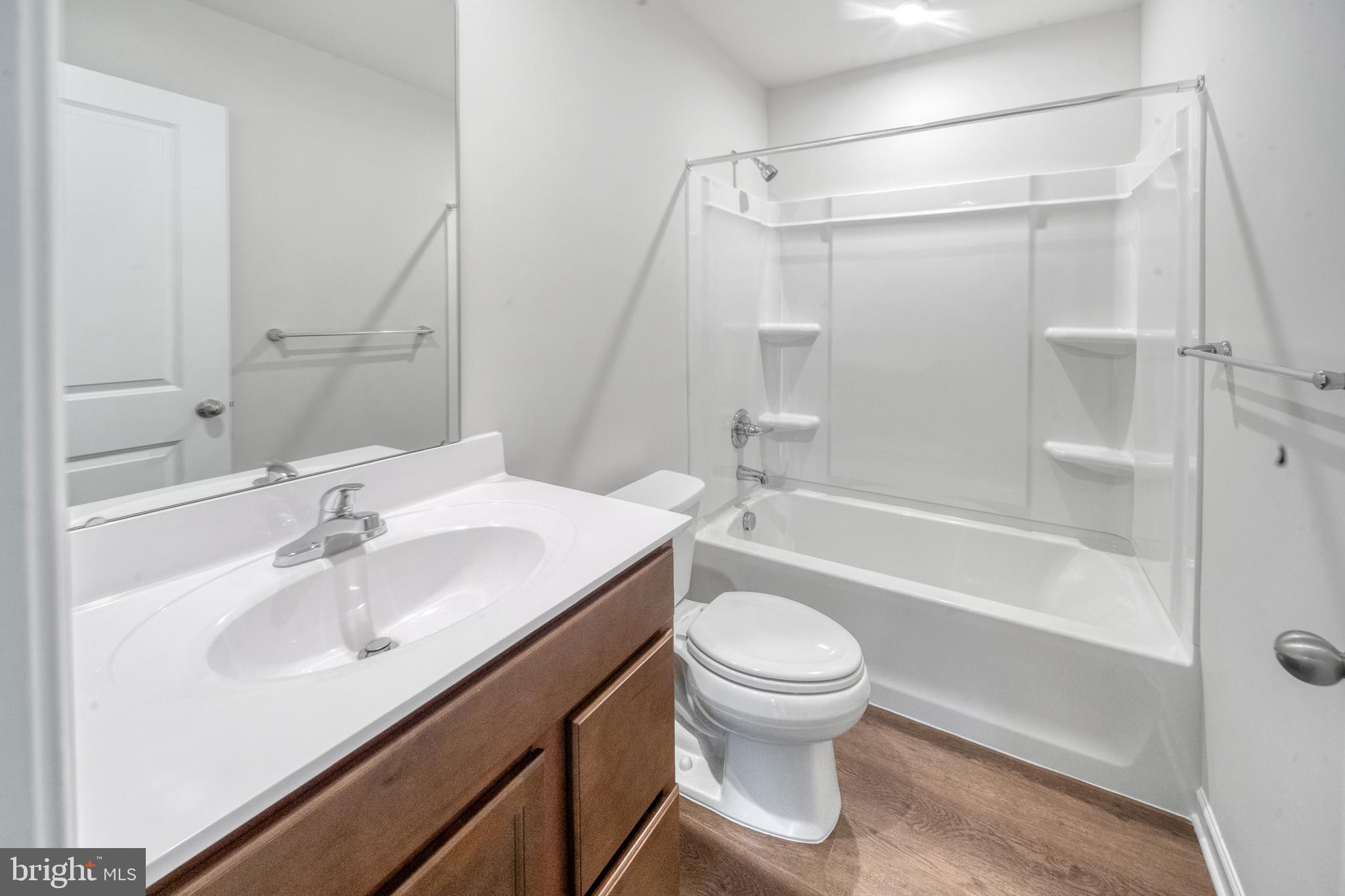417 Circle Drive Winchester, VA 22601 - Photo 20 of 33 a bathroom with a sink toilet and shower