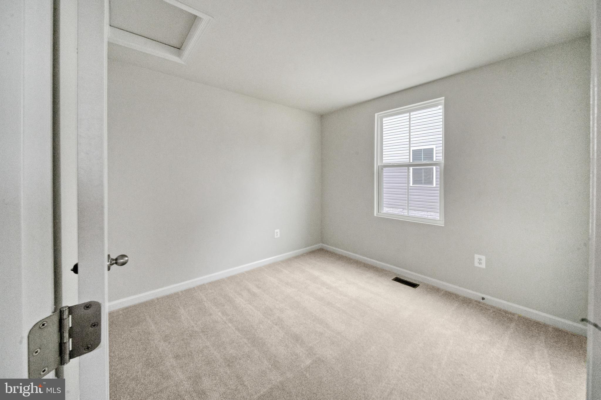 417 Circle Drive Winchester, VA 22601 - Photo 23 of 33 an empty room with windows