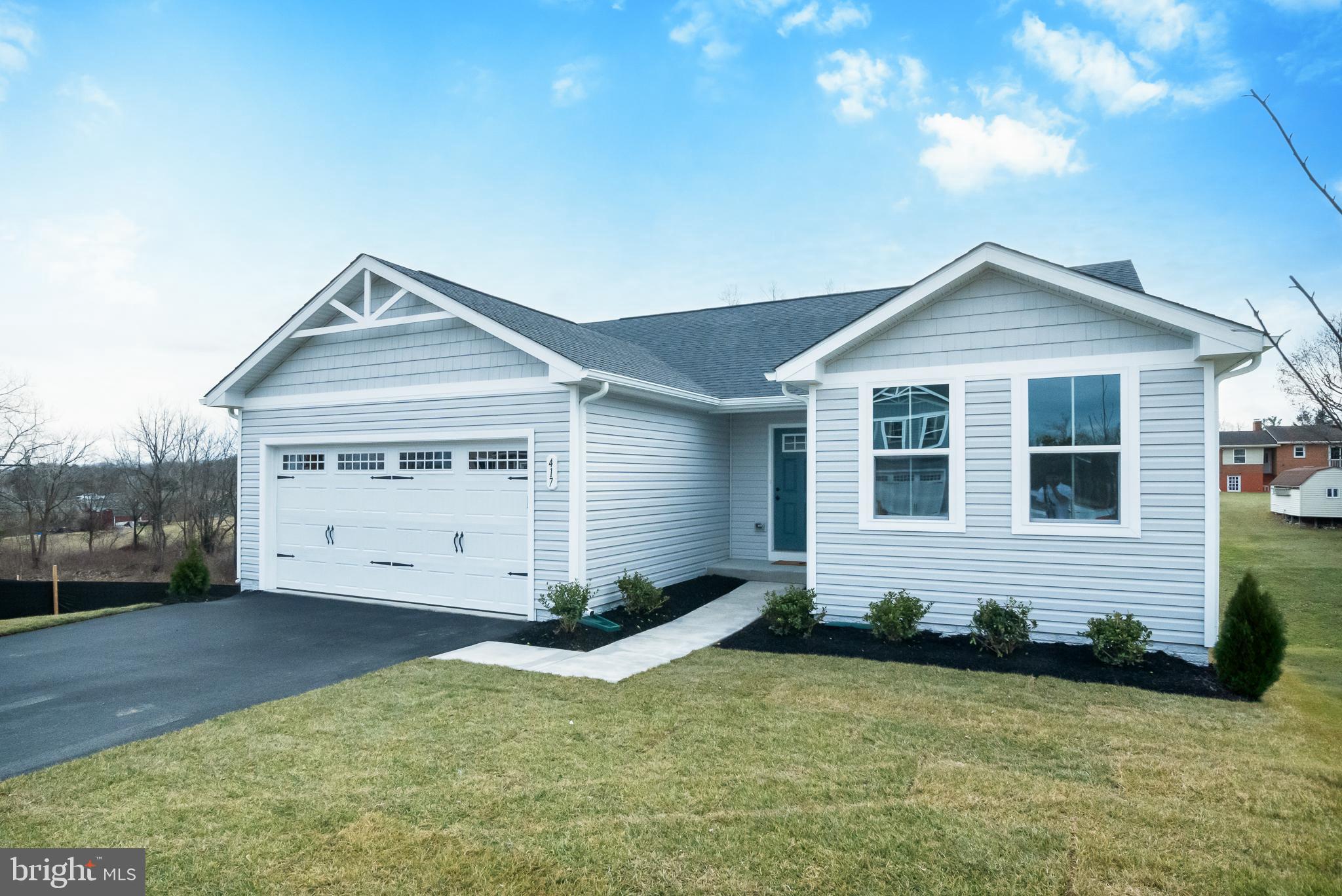 417 Circle Drive Winchester, VA 22601 - Photo 32 of 33 a house view with a garden space