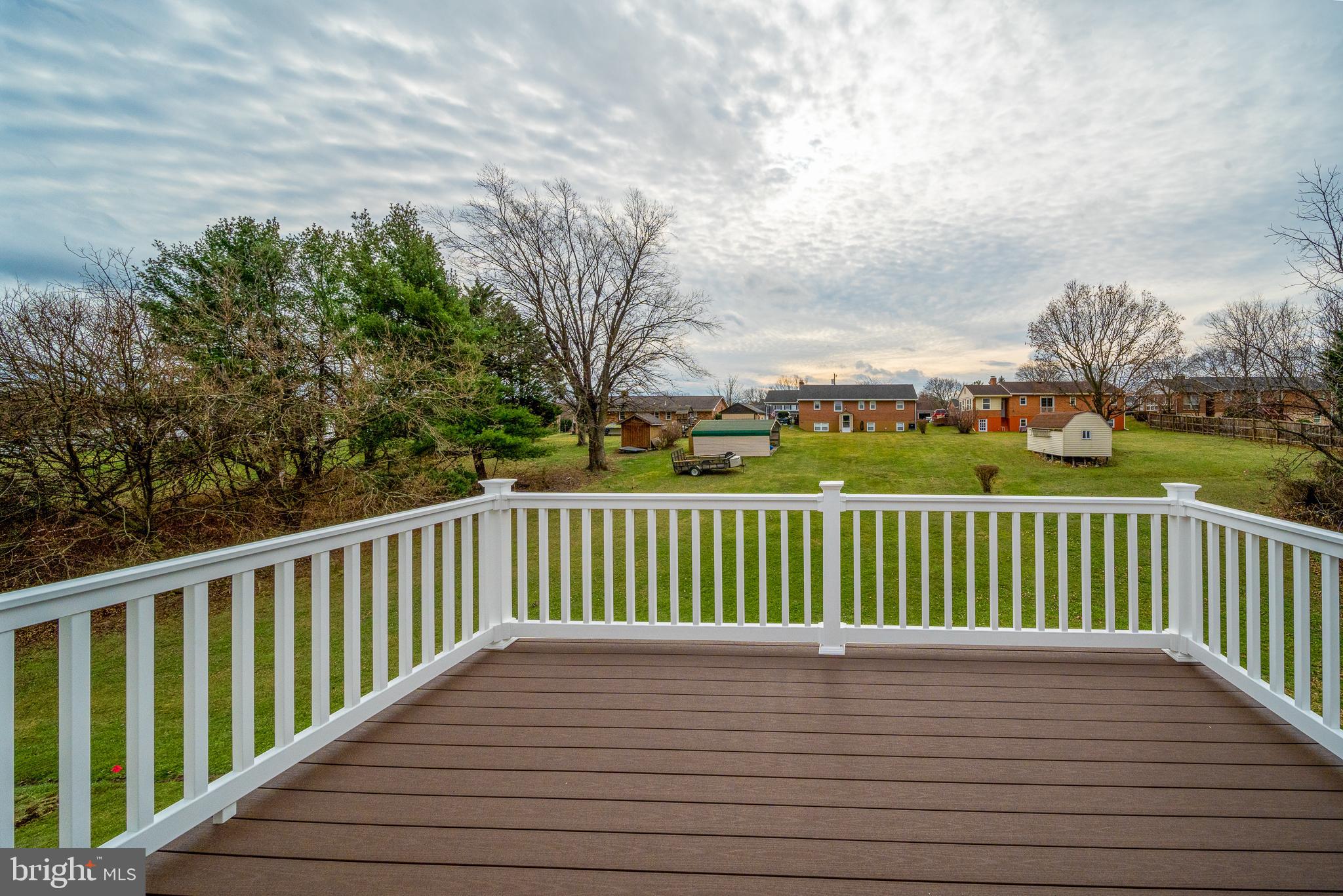 417 Circle Drive Winchester, VA 22601 - Photo 7 of 33 a view of balcony with wooden floor and fence