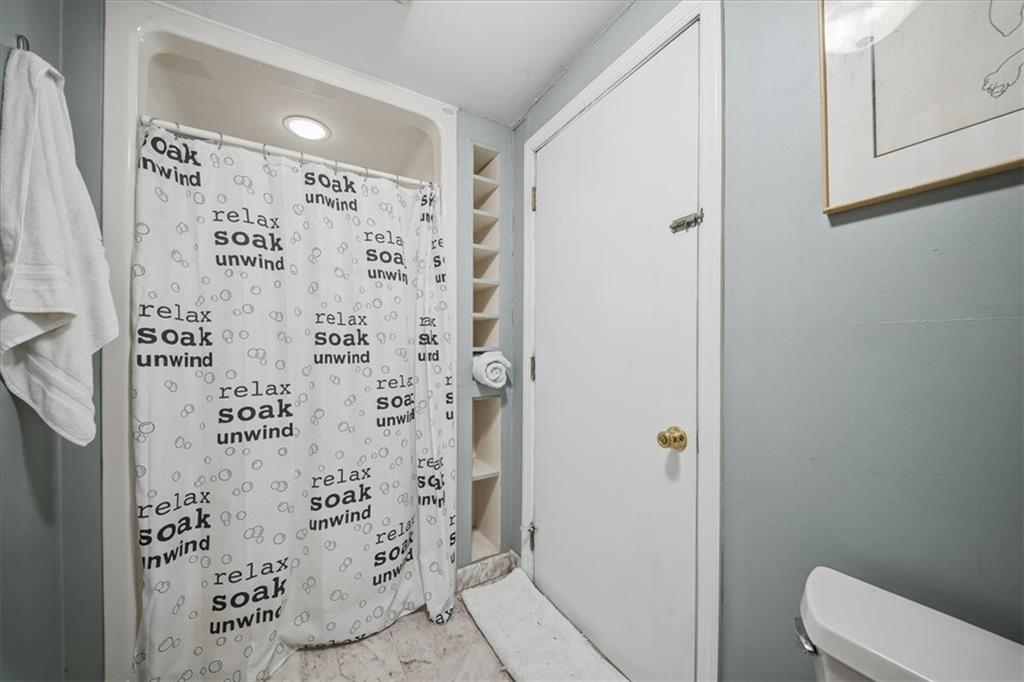 237 Grandview Avenue Pittsburgh, PA 15211 - Photo 21 of 43 a bathroom with a shower and a toilet