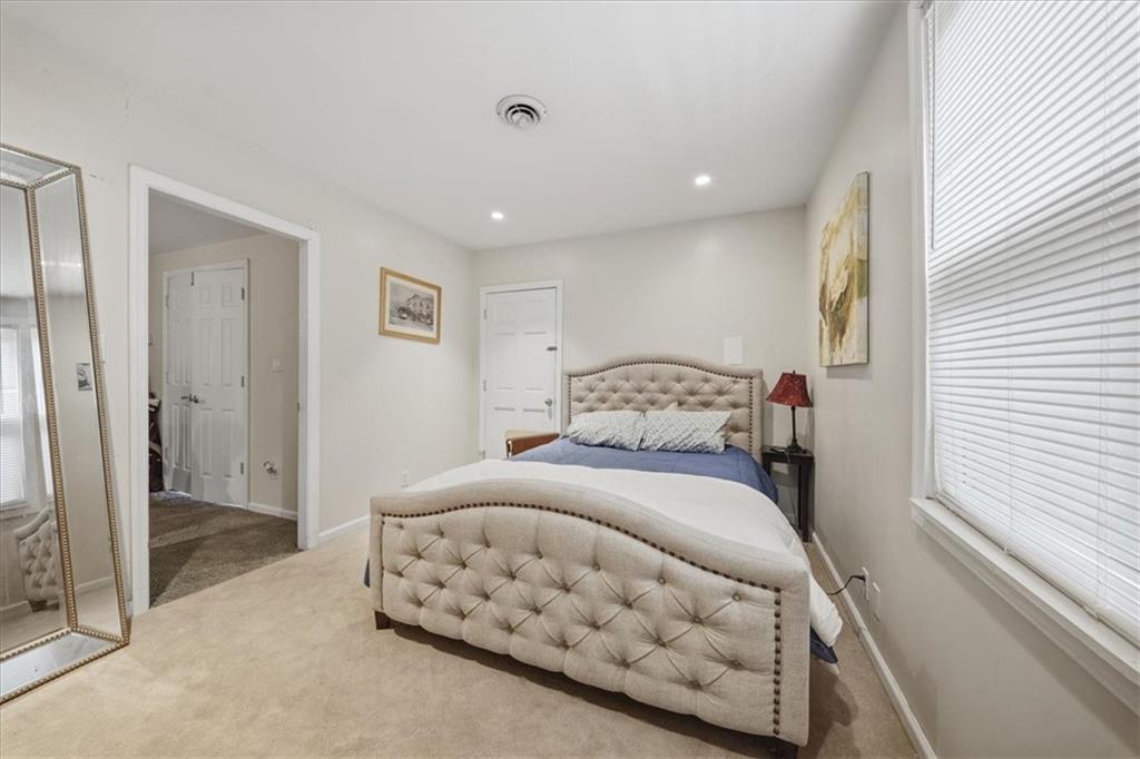 237 Grandview Avenue Pittsburgh, PA 15211 - Photo 23 of 43 a bedroom with a bed and a walk in closet