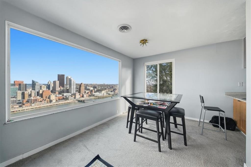 237 Grandview Avenue Pittsburgh, PA 15211 - Photo 28 of 43 a view of a dining room with furniture window and outside view