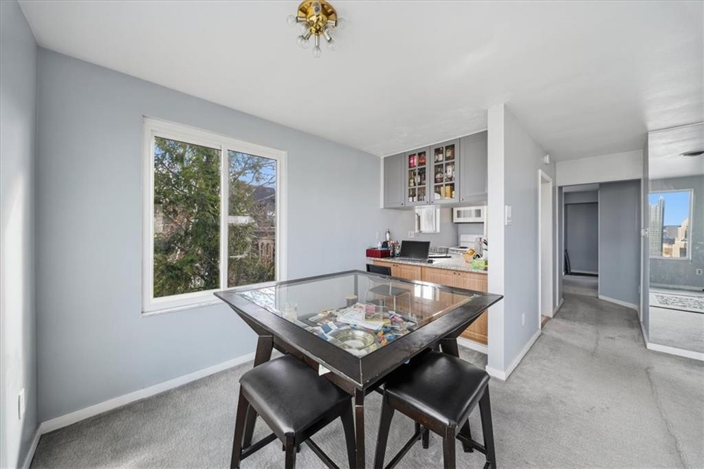 237 Grandview Avenue Pittsburgh, PA 15211 - Photo 32 of 43 a dining room with furniture and window