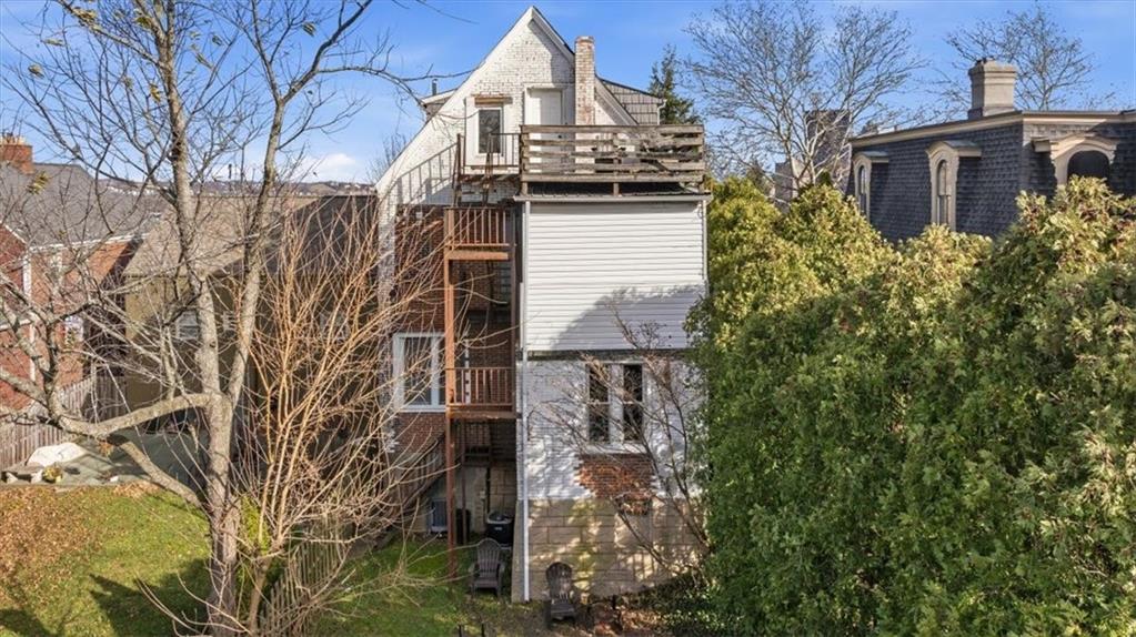 237 Grandview Avenue Pittsburgh, PA 15211 - Photo 37 of 43 a view of a house with a tree