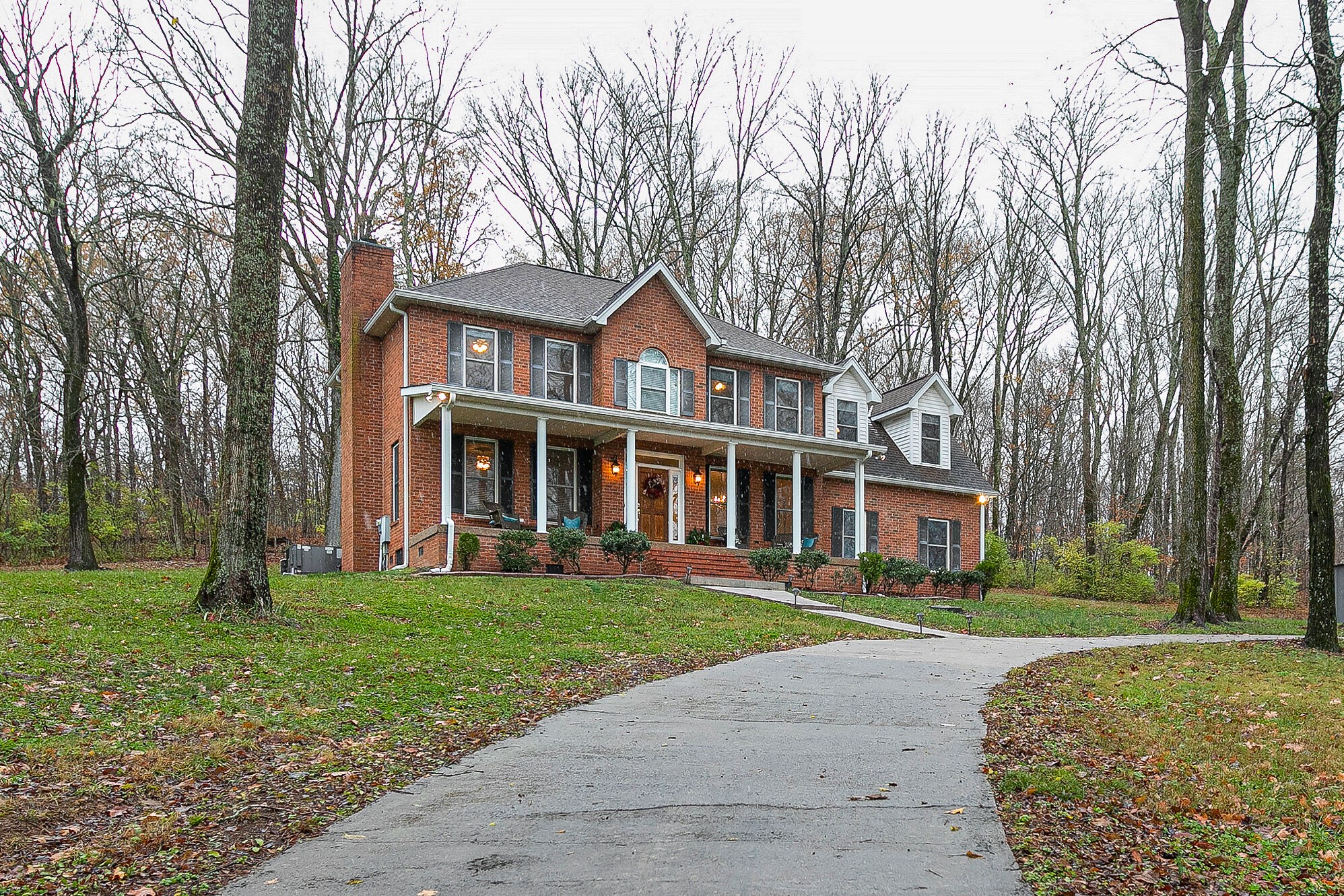 4311 Peytonsville-Trinity Road Franklin, TN 37064 - Photo 2 of 32 a front view of a house with a garden